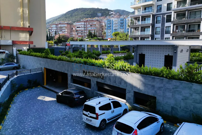 Apartament 1+1 z widokiem na twierdzę Kale — centrum Alanyi, nowy kompleks 10 