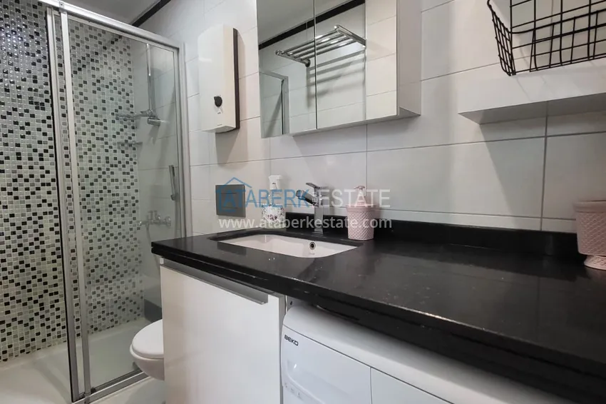 Kupuj  Kompaktowy apartament pod klucz z przeszklonym balkonem 400 metrów od morza - Alanya, dzielnica Oba 24 