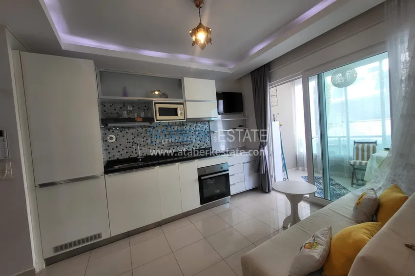 Kupuj  Kompaktowy apartament pod klucz z przeszklonym balkonem 400 metrów od morza - Alanya, dzielnica Oba 7 