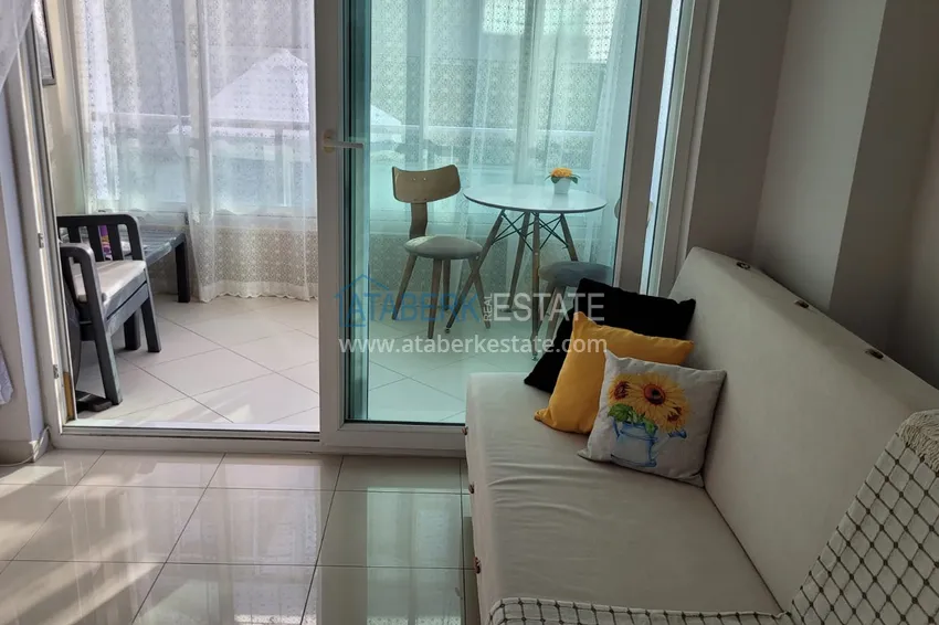Kupuj  Kompaktowy apartament pod klucz z przeszklonym balkonem 400 metrów od morza - Alanya, dzielnica Oba 11 