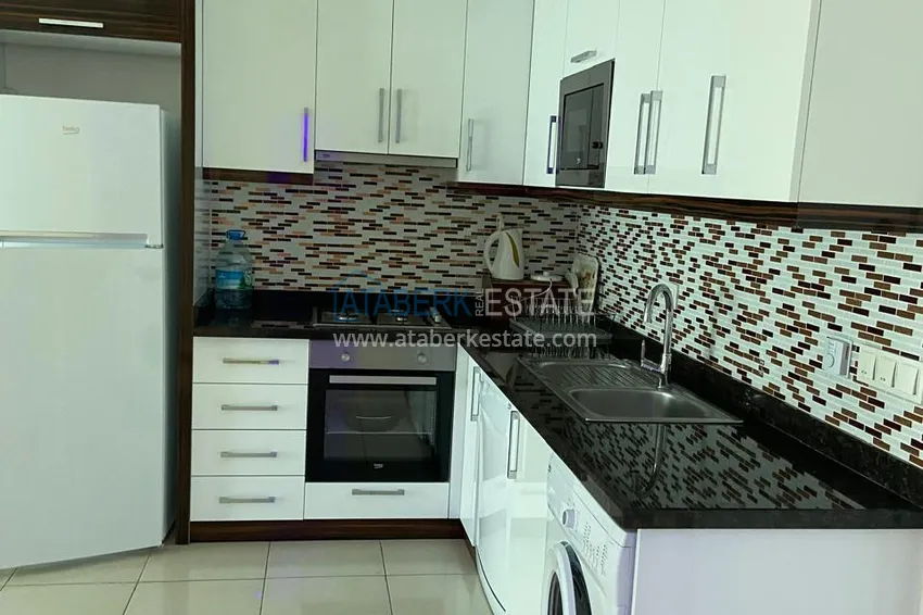 Kupuj  Umeblowany apartament 1+1 z ciepłą podłogą i przeszklonym balkonem — Mahmutlar, Alanya 4 