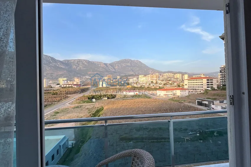 Kupuj  Dwupokojowy apartament z meblami i widokiem na góry w komfortowym kompleksie — Mahmutlar, Alanya 15 
