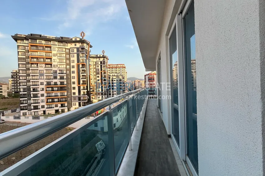 Kupuj  Dwupokojowy apartament z meblami i widokiem na góry w komfortowym kompleksie — Mahmutlar, Alanya 18 