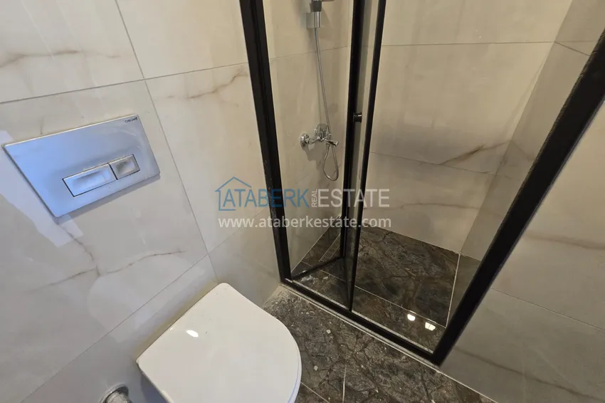 Kupuj  Apartament 1+1 z pięknym wykończeniem w nowoczesnym kompleksie - dzielnica Mahmutlar, Alanya 10 