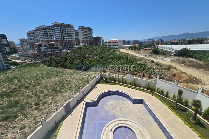 Kupuj  Apartament 1+1 z pięknym wykończeniem w nowoczesnym kompleksie - dzielnica Mahmutlar, Alanya 14 