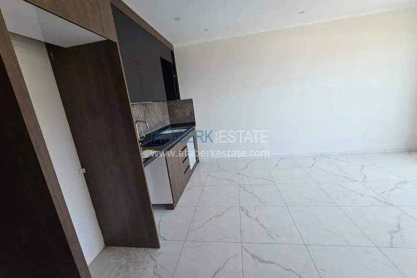 Kupuj  Apartament 1+1 z pięknym wykończeniem w nowoczesnym kompleksie - dzielnica Mahmutlar, Alanya 2 