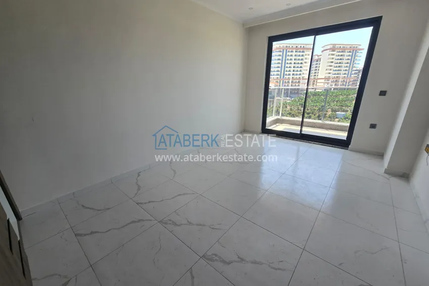 Kupuj  Apartament 1+1 z pięknym wykończeniem w nowoczesnym kompleksie - dzielnica Mahmutlar, Alanya 3 