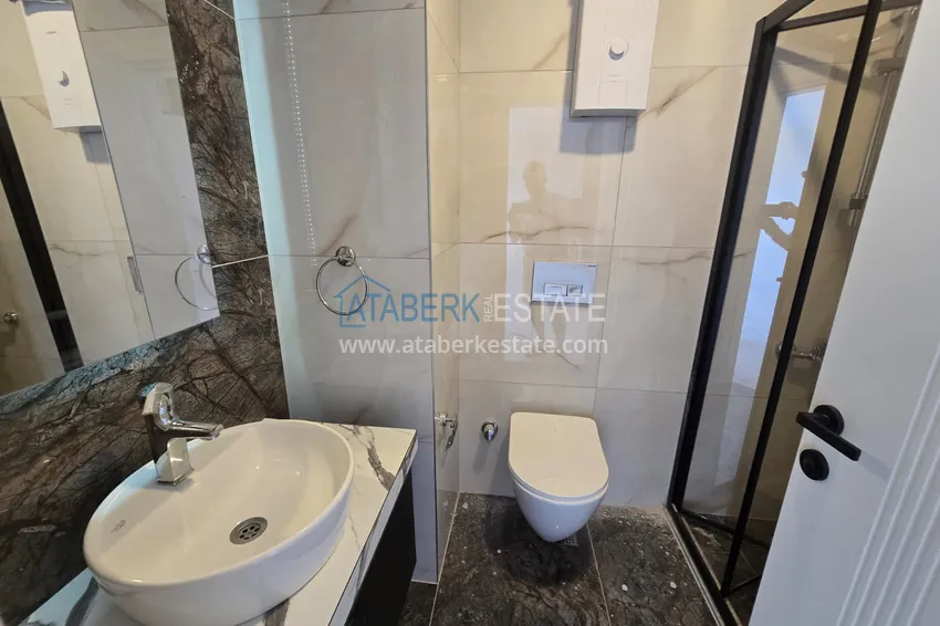Kupuj  Apartament 1+1 z pięknym wykończeniem w nowoczesnym kompleksie - dzielnica Mahmutlar, Alanya 8 
