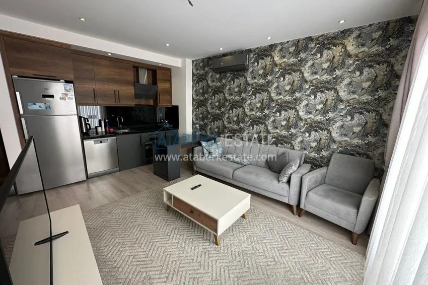 Kupuj Umeblowany apartament z jedną sypialnią w kompleksie z infrastrukturą hotelową — Alanya, Mahmutlar 2