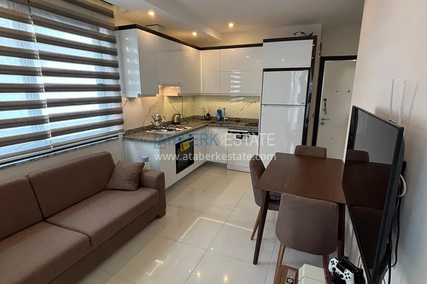 Kupuj  Umeblowany apartament 1+1 zaledwie 300 metrów od morza - dzielnica Mahmutlar, Alanya 2 