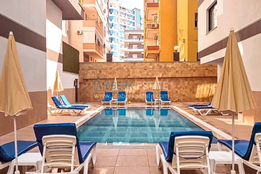 Umeblowany apartament 1+1 zaledwie 300 metrów od morza - dzielnica Mahmutlar, Alanya 4 
