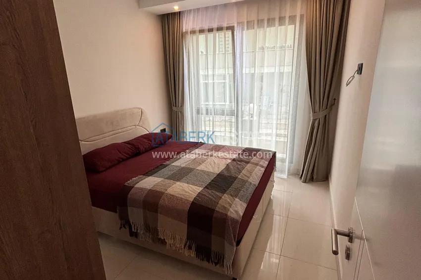 Kupuj  Umeblowany apartament 1+1 zaledwie 300 metrów od morza - dzielnica Mahmutlar, Alanya 4 