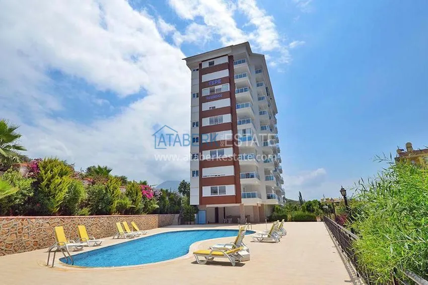 Rynek wtórny w Alanyi - apartament 1+1 z meblami i widokiem na góry, dzielnica Tosmur. Nadaje się do zezwolenia na pobyt 1 