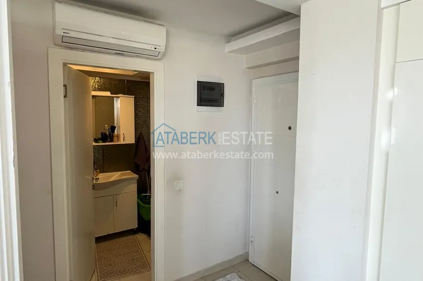 Kupuj  Rynek wtórny w Alanyi - apartament 1+1 z meblami i widokiem na góry, dzielnica Tosmur. Nadaje się do zezwolenia na pobyt 2 