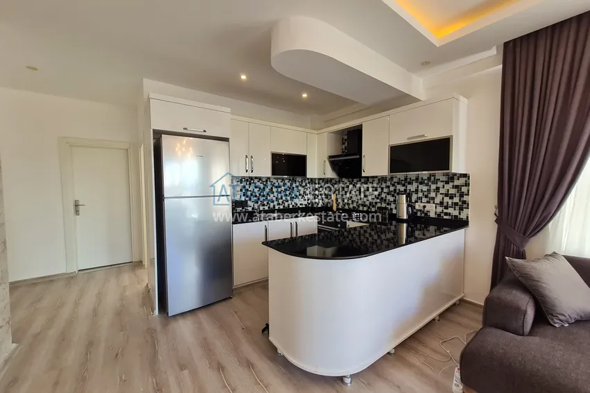 Kupuj  Jednopokojowy apartament z meblami i dwoma balkonami — Alanya, dzielnica Mahmutlar 4 