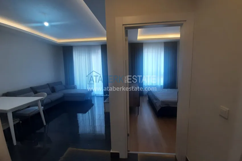 Kupuj  Do długoterminowego wynajęcia jednopokojowe mieszkanie z meblami — Alanya, dzielnica Mahmutlar B53 3 