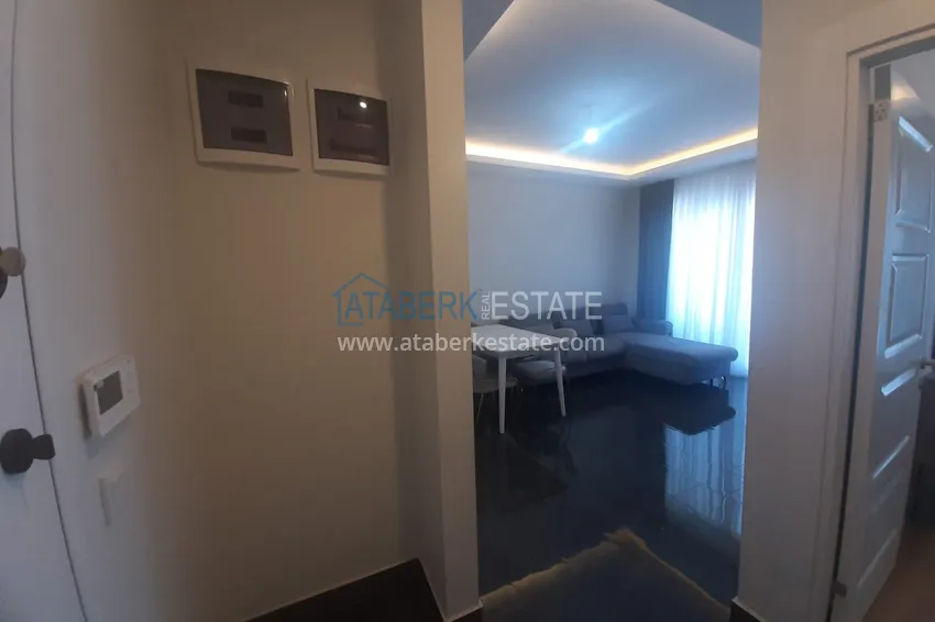 Kupuj  Do długoterminowego wynajęcia jednopokojowe mieszkanie z meblami — Alanya, dzielnica Mahmutlar B53 4 