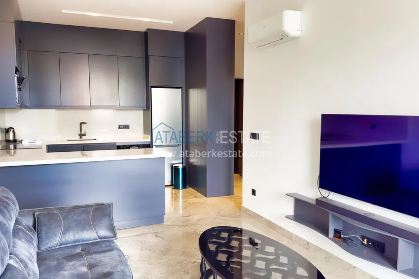 Kupuj  Apartament 1+1 z nowymi meblami — pierwsza linia brzegowa, Kargicak 1 