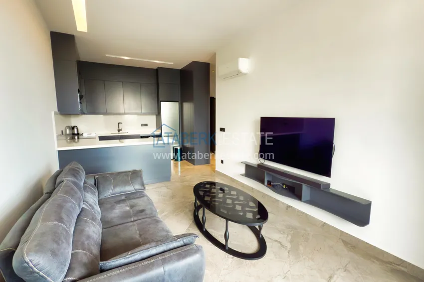 Kupuj  Apartament 1+1 z nowymi meblami — pierwsza linia brzegowa, Kargicak 2 