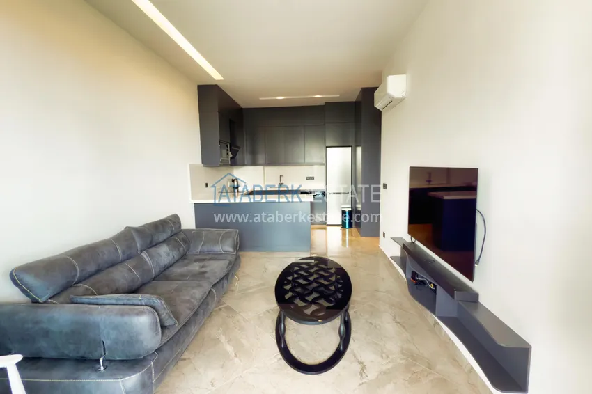 Kupuj  Apartament 1+1 z nowymi meblami — pierwsza linia brzegowa, Kargicak 3 
