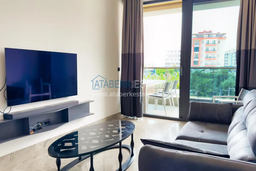 Kupuj  Apartament 1+1 z nowymi meblami — pierwsza linia brzegowa, Kargicak 4 