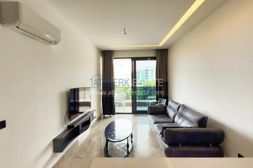 Kupuj  Apartament 1+1 z nowymi meblami — pierwsza linia brzegowa, Kargicak 7 