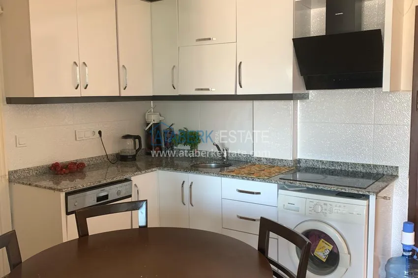 Kupuj  Kamienica dla dwóch właścicieli - apartament z ogrodem i panoramicznym widokiem w kompleksie hotelowym, Mahmutlar 14 