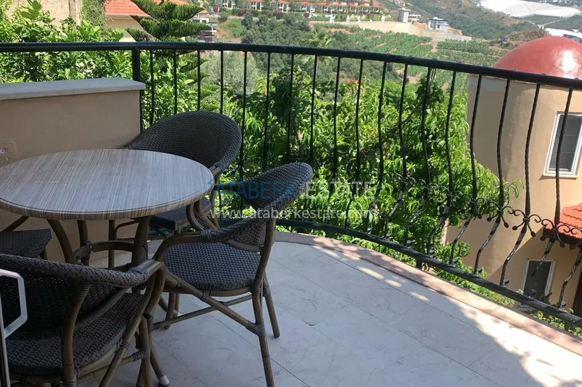 Kupuj  Kamienica dla dwóch właścicieli - apartament z ogrodem i panoramicznym widokiem w kompleksie hotelowym, Mahmutlar 23 