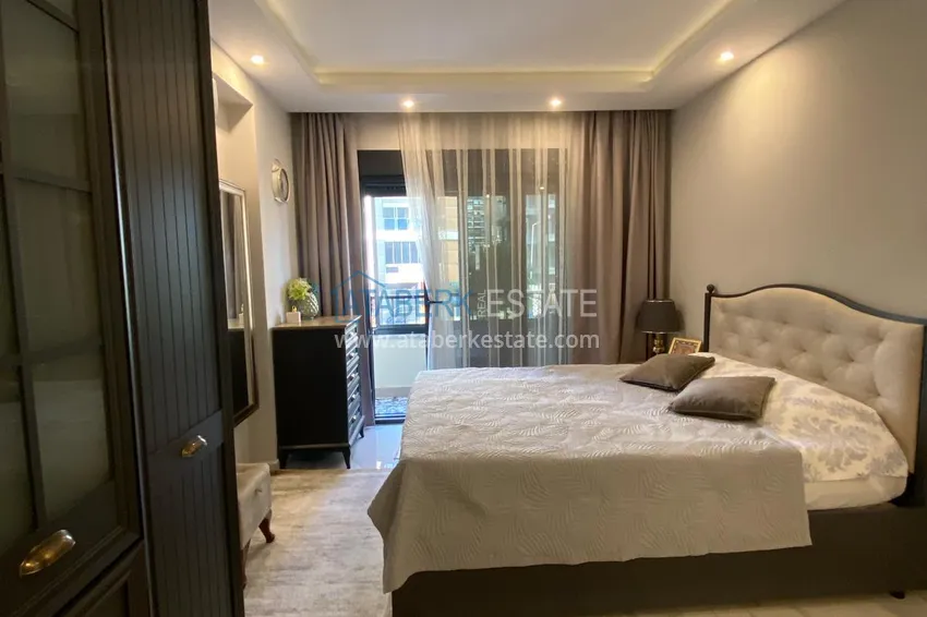 Kupuj  Umeblowany apartament z dwiema sypialniami w centrum Mahmutlar, zaledwie 200 metrów od plaży 13 