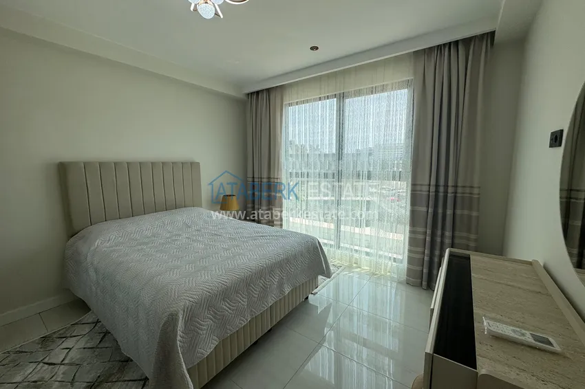 Kupuj  Do wynajęcia długoterminowego - stylowy apartament 2+1 pod klucz w luksusowym kompleksie hotelowym, Alanya, dzielnica Turkler I12 13 