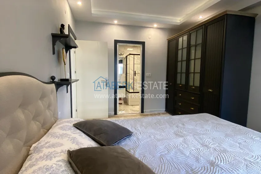 Kupuj  Umeblowany apartament z dwiema sypialniami w centrum Mahmutlar, zaledwie 200 metrów od plaży 15 