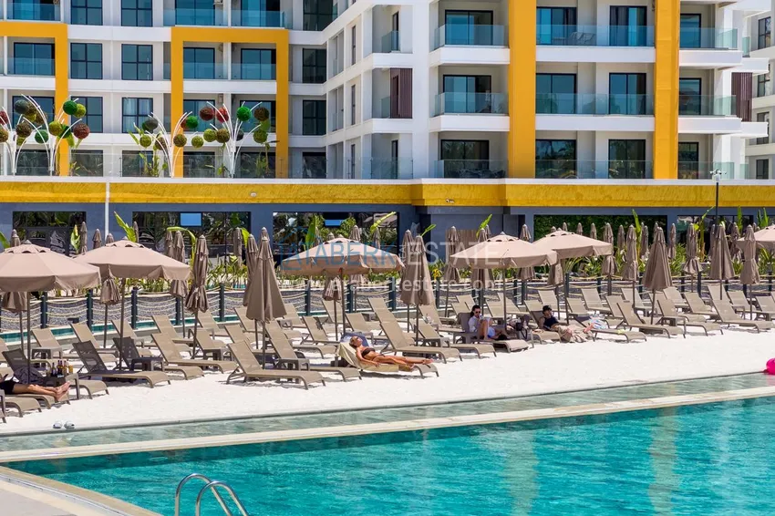 Do wynajęcia długoterminowego - stylowy apartament 2+1 pod klucz w luksusowym kompleksie hotelowym, Alanya, dzielnica Turkler I12 22 
