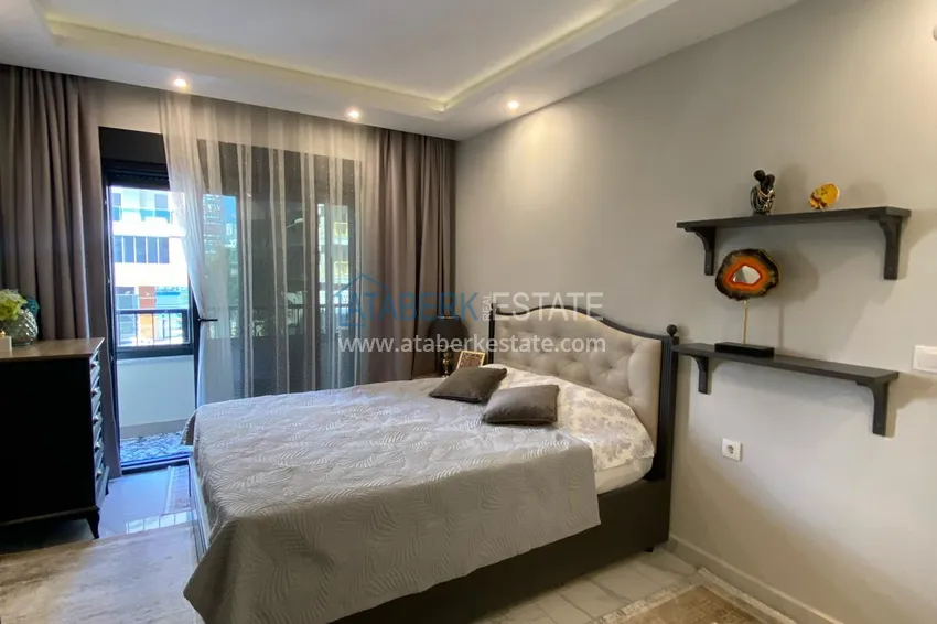 Kupuj  Umeblowany apartament z dwiema sypialniami w centrum Mahmutlar, zaledwie 200 metrów od plaży 16 