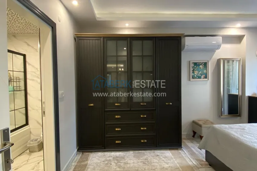 Kupuj  Umeblowany apartament z dwiema sypialniami w centrum Mahmutlar, zaledwie 200 metrów od plaży 18 