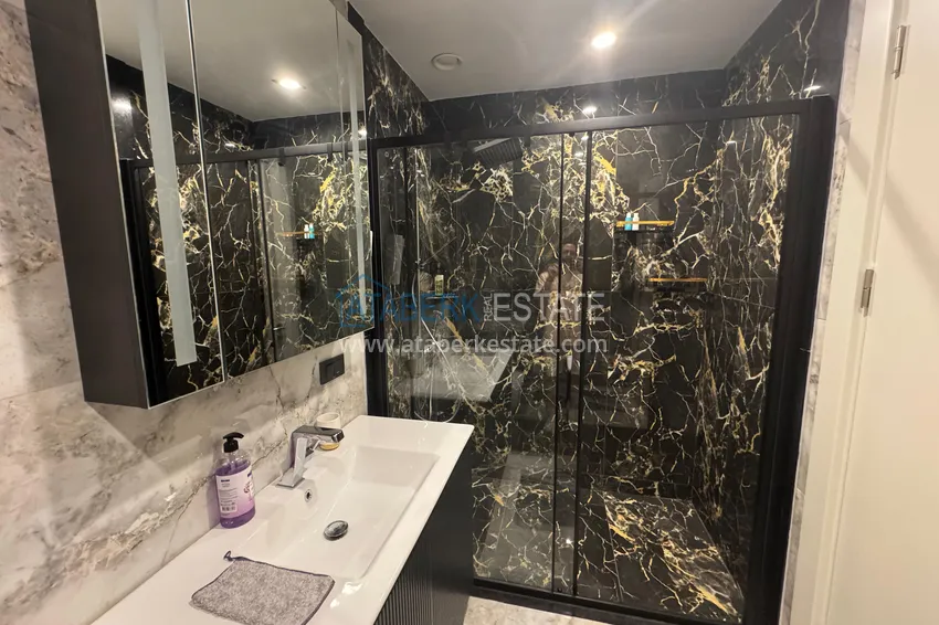 Kupuj  Do wynajęcia długoterminowego - stylowy apartament 2+1 pod klucz w luksusowym kompleksie hotelowym, Alanya, dzielnica Turkler I12 19 