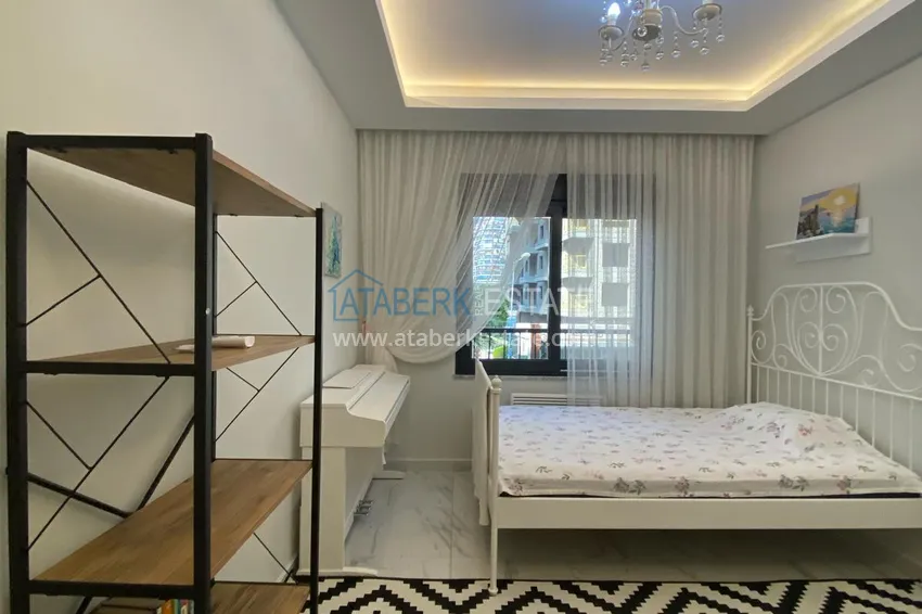 Kupuj  Umeblowany apartament z dwiema sypialniami w centrum Mahmutlar, zaledwie 200 metrów od plaży 21 