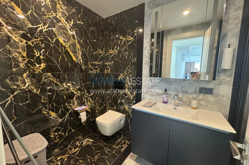Kupuj  Do wynajęcia długoterminowego - stylowy apartament 2+1 pod klucz w luksusowym kompleksie hotelowym, Alanya, dzielnica Turkler I12 20 