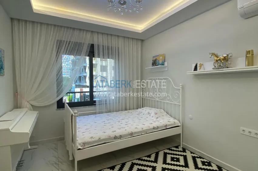 Kupuj  Umeblowany apartament z dwiema sypialniami w centrum Mahmutlar, zaledwie 200 metrów od plaży 22 