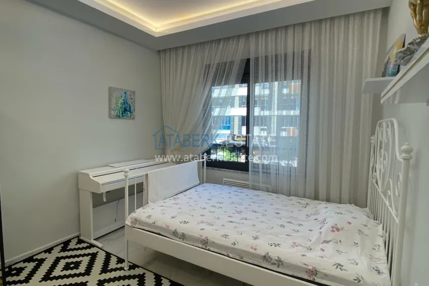Kupuj  Umeblowany apartament z dwiema sypialniami w centrum Mahmutlar, zaledwie 200 metrów od plaży 23 