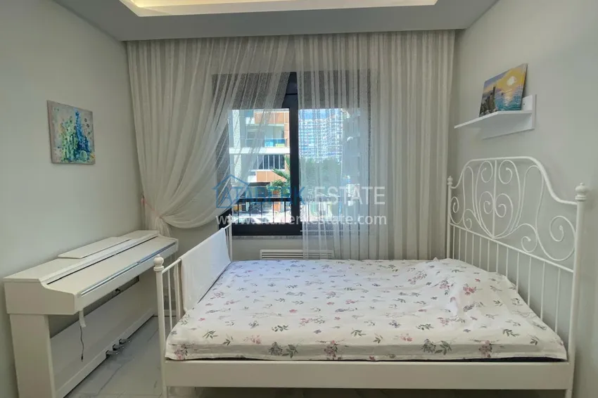 Kupuj  Umeblowany apartament z dwiema sypialniami w centrum Mahmutlar, zaledwie 200 metrów od plaży 25 