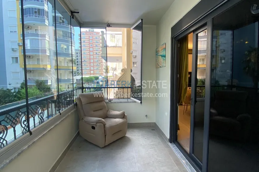 Kupuj  Umeblowany apartament z dwiema sypialniami w centrum Mahmutlar, zaledwie 200 metrów od plaży 28 