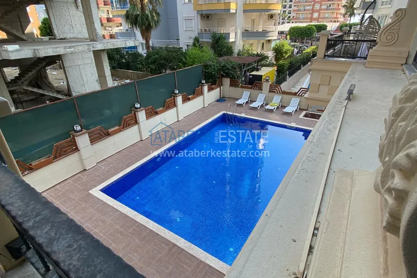 Kupuj  Umeblowany apartament z dwiema sypialniami w centrum Mahmutlar, zaledwie 200 metrów od plaży 32 