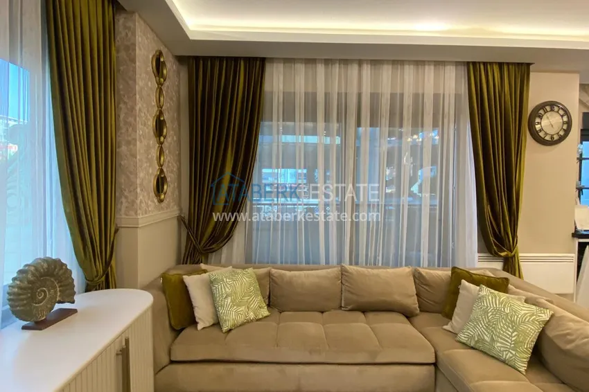 Kupuj  Umeblowany apartament z dwiema sypialniami w centrum Mahmutlar, zaledwie 200 metrów od plaży 7 