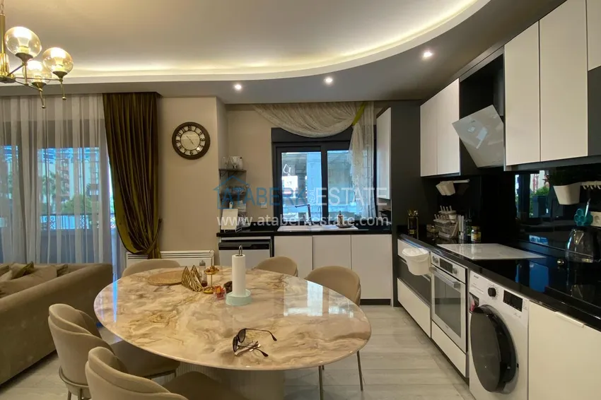 Kupuj  Umeblowany apartament z dwiema sypialniami w centrum Mahmutlar, zaledwie 200 metrów od plaży 10 