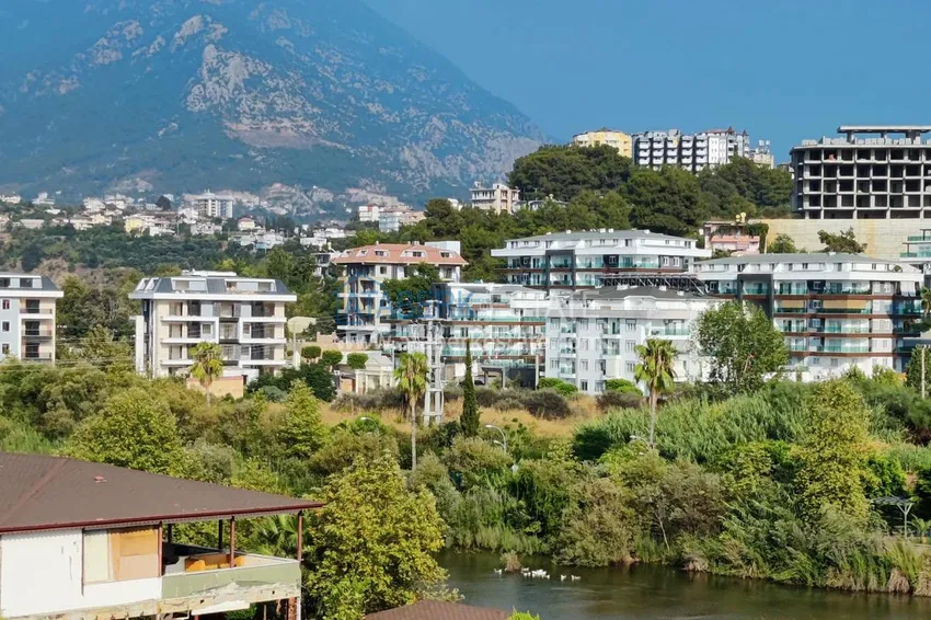 Kupuj  Umeblowane mieszkanie 2+1 z widokiem na morze i górską rzekę Dim-Chay, dzielnica Tosmur — Alanya 24 
