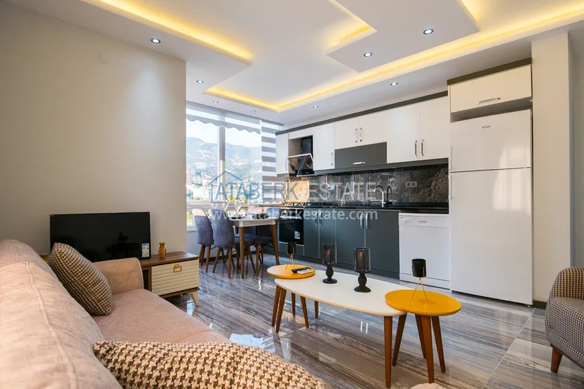 Kupuj  Gotowe mieszkanie w centrum Alanyi, na zezwolenie na pobyt — apartament z jedną sypialnią z meblami i widokiem na góry 5 