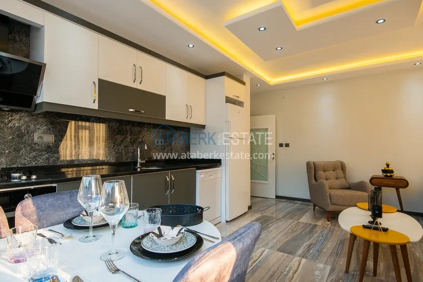 Kupuj  Gotowe mieszkanie w centrum Alanyi, na zezwolenie na pobyt — apartament z jedną sypialnią z meblami i widokiem na góry 6 