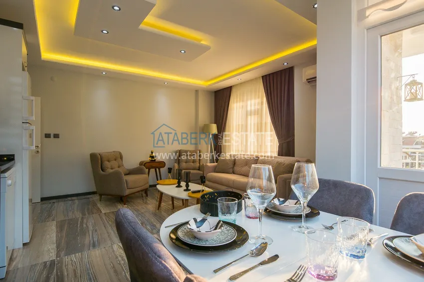 Kupuj  Gotowe mieszkanie w centrum Alanyi, na zezwolenie na pobyt — apartament z jedną sypialnią z meblami i widokiem na góry 7 