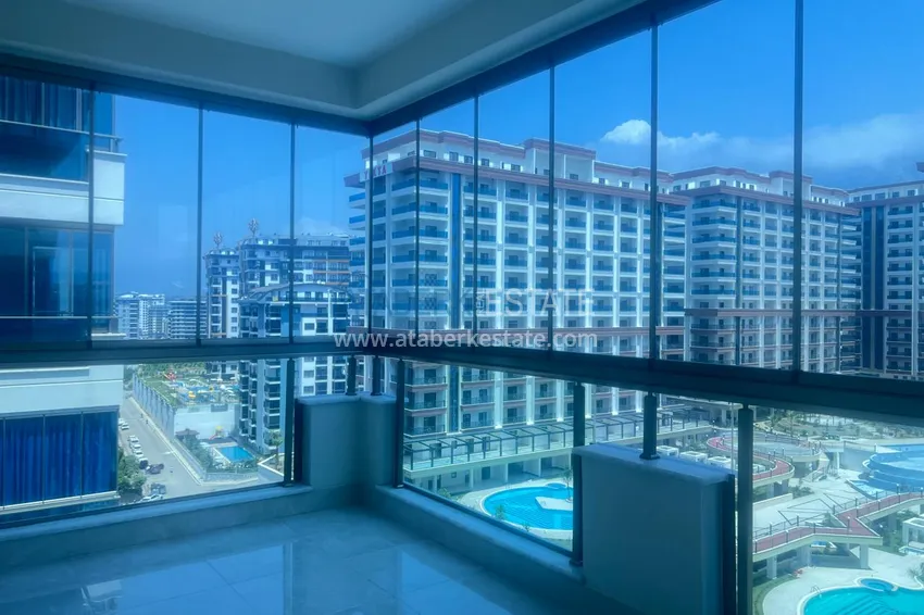 Kupuj  Jednopokojowy apartament pod klucz z dwoma przeszklonymi balkonami w prestiżowym kompleksie - Mahmutlar, Alanya 13 