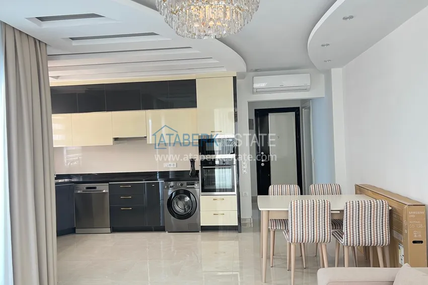 Kupuj  Jednopokojowy apartament pod klucz z dwoma przeszklonymi balkonami w prestiżowym kompleksie - Mahmutlar, Alanya 2 